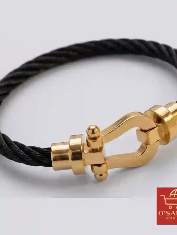 Bracelet homme avec câble torsadé noir et boucle dorée